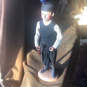 Ceramic Russian man doll in traditional costume